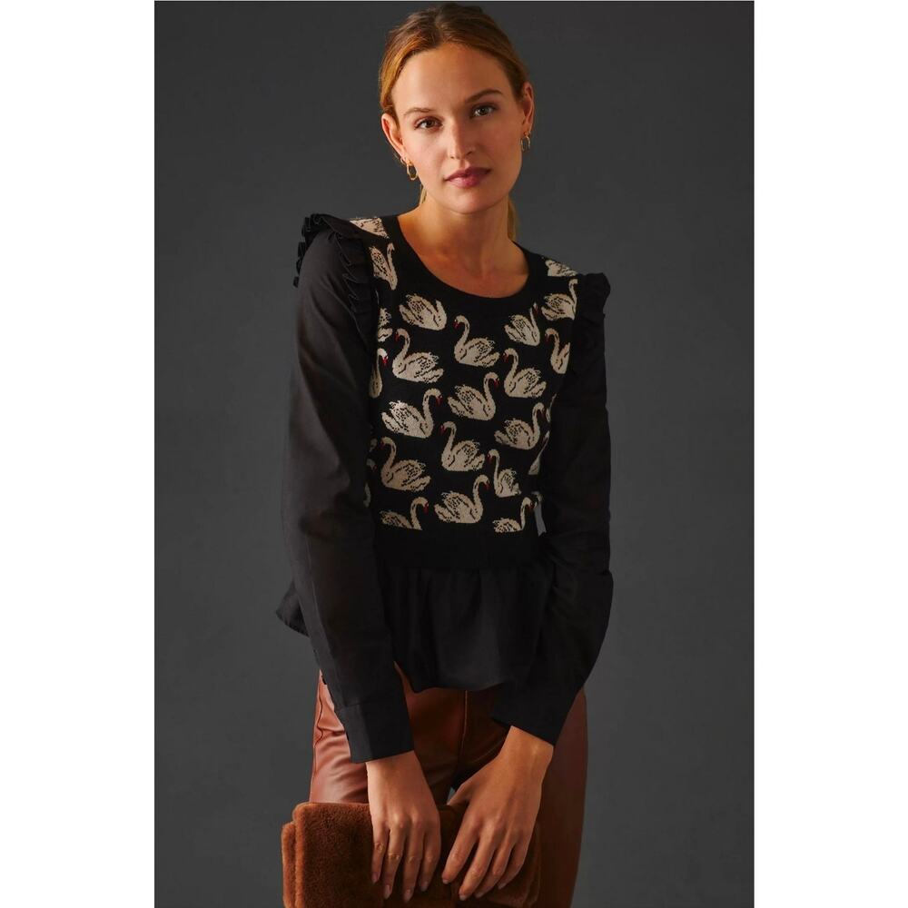 Maeve Black Sweater with Cream Swan Pattern and Red Accents